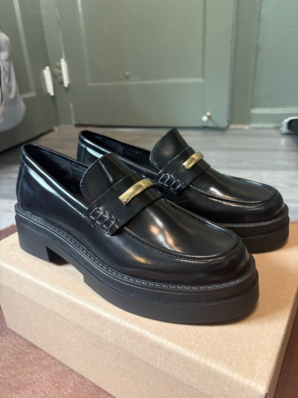 Steve Madden Black Leather Platform Loafers with Gold Accent